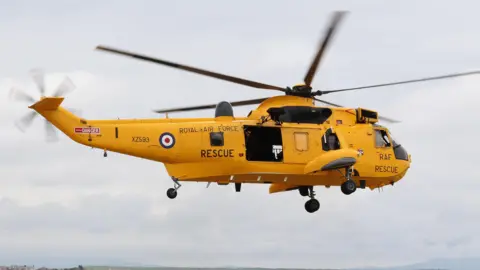 Military aircrew pursuing MoD after cancer diagnoses reaches 180 Getty Images A Sea King RAF search and rescue yellow rotary helicopter.