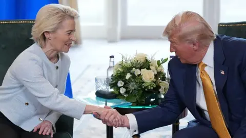 What are tariffs, how do they work and why is Trump using them? Getty Images European Commission President Ursula von der Leyen shakes hands with US President Donald Trump during a meeting at Trump Turnberry golf club in Scotland on 27 July 2025