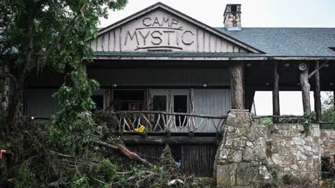 A girls' summer camp cut short by deadly disaster Getty Images Outside building of Camp Mystic