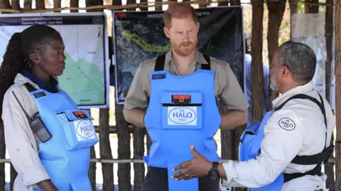 Prince Harry in Diana's footsteps with landmine walk in Angola PA Media Prince Harry in Angola wearing body armour to clear a minefield
