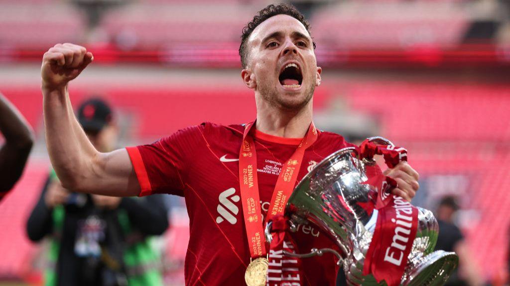 Diogo Jota death: Liverpool striker's best moments in pictures Diogo Jota celebrates with the FA Cup trophy following Liverpool's win over Chelsea in 2022