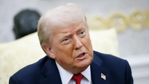 Trump threatens Russia with tariffs while unveiling new Ukraine weapons plan Getty Images A headshot of Trump