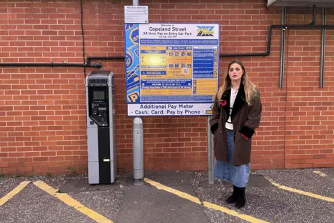 New government code of practice aims to stop unfair parking charges BBC Rosey Hudson standing by a car park paying machine in Copeland Street, Derby