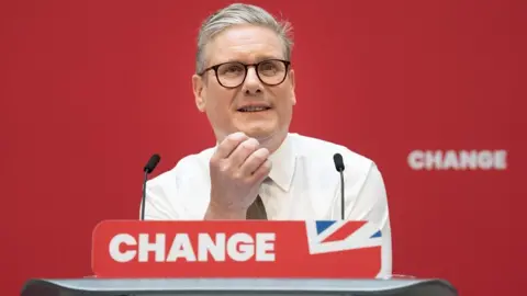 The secret of the perfect political slogan Getty Images Sir Keir Starmer smiling in front of a podium with the word "change" written on it