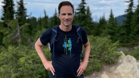 How are trade deals actually negotiated? Getty Images Former Canadian trade negotiator Jason Langrish wearing casual clothing while standing in the great outdoors