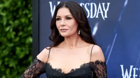 Jenna Ortega says sudden fame was 'very overwhelming' Getty Images Catherine Zeta-Jones attends Netflix's "Wednesday" ATAS Official Photo Call at Hollywood Forever on April 29, 2023 in Hollywood, California