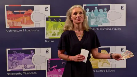 Bank of England to redesign banknotes BBC Bank of England chief cashier Victoria Cleland holds banknotes and stands in front of mock-ups of new themed notes.