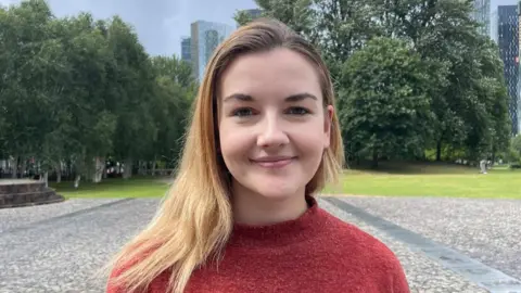 Rents rise by £221 a month in three years, Zoopla analysis suggests Neysa Killeen stands, smiling, in a park with grass and trees behind her.