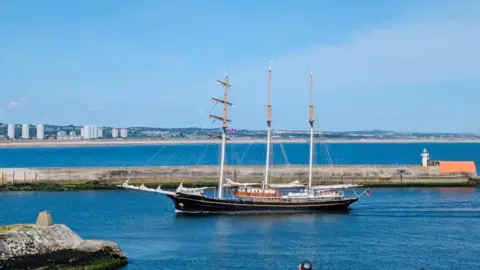 'Party city' event gets under sail Dominik Lagowski Tall ship coming into Aberdeen harbour under a blue sky