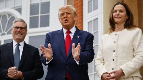 Donald Trump continues feud with Sadiq Khan calling him a nasty person EPA Keir Starmer meets the US president with his wife Victoria.