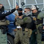 Trump surveys damage in Texas as search efforts continue for 160 missing