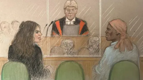 I've never seen a case like Constance Marten and Mark Gordon's Julia Quenzler A court sketch showing Constance Marten, a woman with long brown hair wearing a dark top, and Mark Gordon, who has a peach-coloured headscarf and is wearing a shirt, looking at each other while sitting in a glass dock in court with the judge before them wearing a wig and red and black robes.