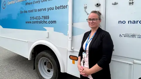 How Canada became the centre of a measles outbreak in North America Canadian Press Catalina Friesen, a personal support worker and Low German-speaking liaison, stands in front of a bus outfitted as a mobile walk-in clinic, in St. Thomas, Ontario. She has a slight smile on her face and is wearing a dark blazer and a white T-shirt
