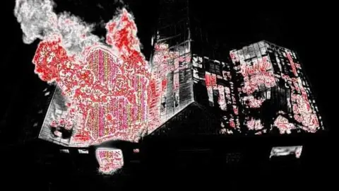 Homes evacuated as factories and tyres burn near Tipton West Midlands Fire Service Heat map of the factory showing large areas of red across the roofs of the affected premises.