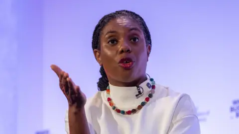Ban some foreigners from sickness benefits, Badenoch urges Getty Images Kemi Badenoch, leader of the Conservatives, shown speaking at a business conference in June