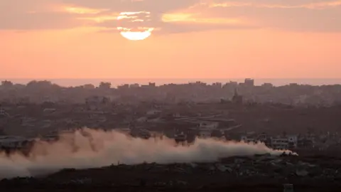 US allies break with Trump to force diplomatic shift on Gaza REUTERS/Ronen Zvulun Smoke rises from Gaza as the sun sets, as seen from the Israeli side of the Israel-Gaza border