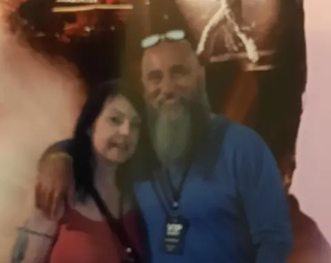 'Atrocious and misleading' show upsets some fans Tracey Baldwin Man and woman smiling in front of an Elvis poster