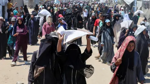 Gaza aid site offered a 'women only' day. It didn't stop the killing Reuters Palestinian women and girls seek aid supplies from a distribution site in southern Gaza run by the US- and Israel-backed Gaza Humanitarian Foundation (GHF), near Rafah, in the southern Gaza Strip (24 July 2025)