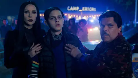 Jenna Ortega says sudden fame was 'very overwhelming' Netflix Catherine Zeta-Jones as Morticia Addams, Isaac Ordonez as Pugsley Addams, Luis Guzmán as Gomez Addams in season two of Wednesday.