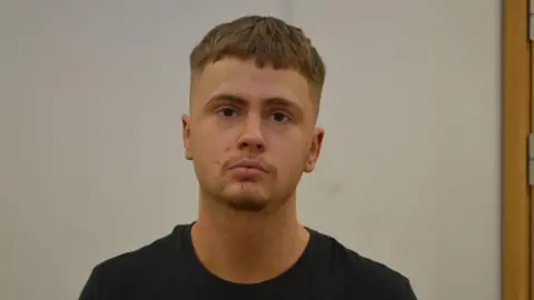 Why small-time criminals burned a London warehouse for Russia's mercenary group Wagner Metropolitan Police Mugshot of Ashton Evans