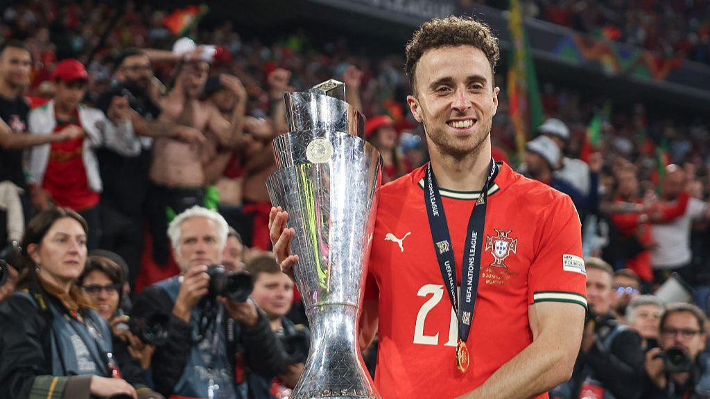 Diogo Jota death: Liverpool striker's best moments in pictures Diogo Jota of Portugal poses with the Uefa Nations League trophy after his team's victory in the final against Spain
