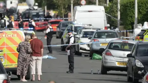 Getty Images The police cordon in Southport following the attack. 