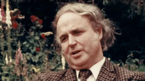 Investigating one of the UK's most abusive cults BBC/Docsville Studios A head and shoulders-shot of Noel Stanton in a tweed jacket with a comb-over haircut taken from a TV interview in the 1970s or 1980s.