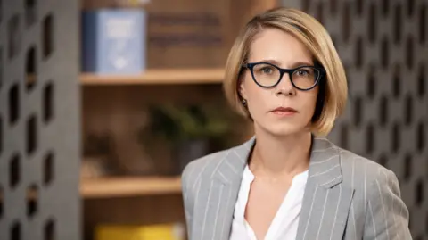 Space technology: Lithuania's promising space start-ups Space Hub LT Blonde haired Eglė Elena Šataitė in a pin-striped jacket