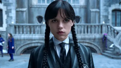 Jenna Ortega says sudden fame was 'very overwhelming' Netflix Jenna Ortega seen in Netflix's second season of Wednesday, wearing a Nevermore Academy uniform