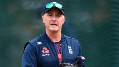 Health professionals failed Graham Thorpe, coroner says PA Media An image of former England and Surrey cricketer Graham Thorpe. He is wearing a new balance gilet with England and Natwest emblems. He is wearing a cap and sunglasses.