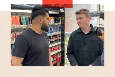The illegal cigarettes trade in the UK signals a deeper problem BBC/Phillip Edwards Ed Thomas speaks to a corner shop assistant