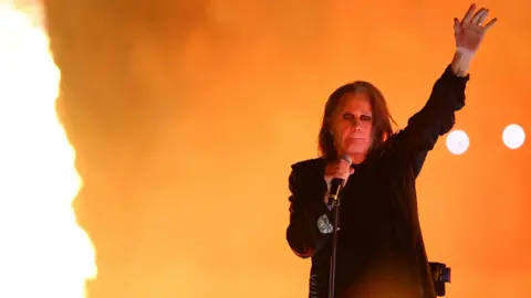 Bandmates and fans pay tribute to Black Sabbath singer Reuters Ozzy Osbourne performs on stage, next to fire