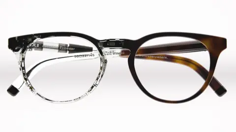 'Autofocus' specs promise sharp vision, near or far IXI A pair of IXI glases. On one side you can see through to the electronics