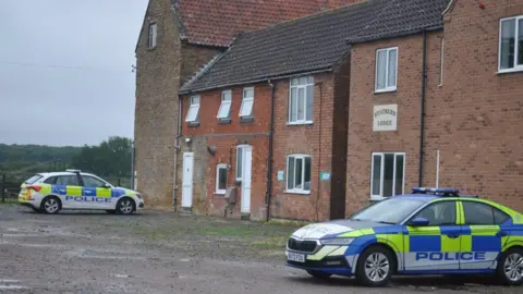 NEMM Police cars parked outside Stathern Lodge