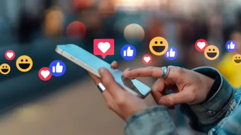Anger and confusion as Meta overturns more Instagram account bans Getty Images An illustration of social media, with a person scrolling on their phone and emojis graphics such as a like or a smile are visible