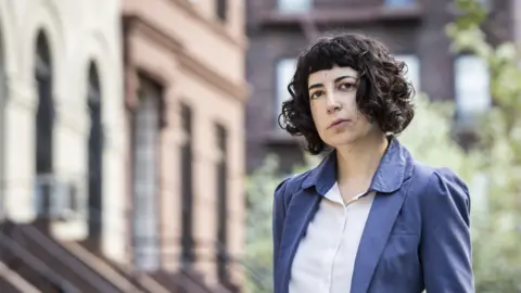 Will AI make language dubbing easy for film and TV? Natan Dvir Neta Alexander in a blue jacket