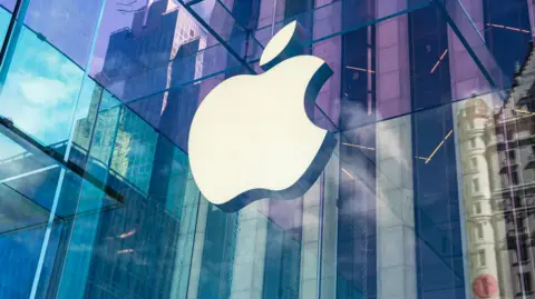 Court documents shed new light on UK-Apple row over user data Getty Images The Apple logo on a window, with a city scene including skyscrapers reflected on the window