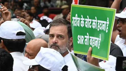 Why India's polling monitor is facing a test of credibility AFP via Getty Images Rahul Gandhi and other members of parliament from India's opposition during their protest march from Parliament to the Election Commission office against the Special Intensive Revision (SIR) of electoral rolls in poll-bound Bihar and allegations of "voter fraud" during the 2024 Lok Sabha elections, in New Delhi, India.