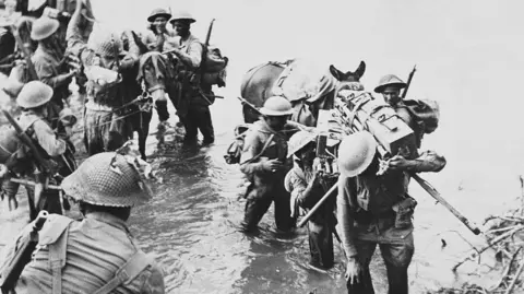 The WW2 veteran who moved Queen Camilla to tears Archive Photos/Getty Images Indian troops of the 26th Indian Brigade, 36th Indian Infantry Division of the British 14th Army unloading ammunition boxes and supplies from pack mules climb the riverbank after crossing the Nammeiit River at Myitson, Burma (Myanmar) during the Burma Campaign against the occupying Imperial Japanese Army, circa March 1945