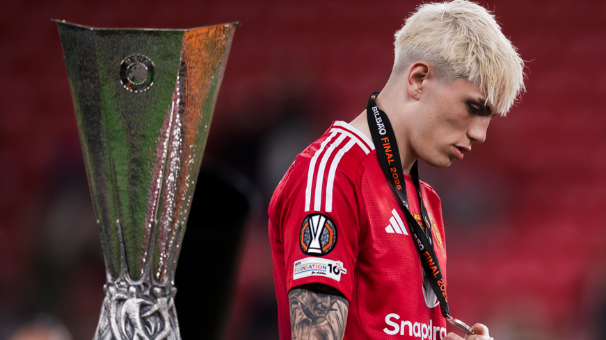 'Limbo XI' - which 'unwanted' players need to move? Manchester United winger Alejandro Garnacho walks past the Europa League trophy after his side's defeat to Tottenham in the final