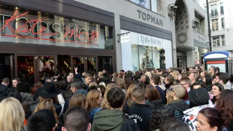 Topshop returns to the high street, but can it get its cool back? Getty Images Crowds at the launch of Kate Moss' collection for Topshop at Topshop, Oxford Street