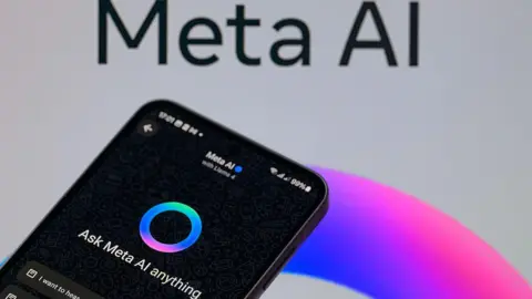 Meta investigated over AI having 'sensual' chats with children Getty Images A black smartphone displaying Meta AI is shown next to a background of a post for Meta AI