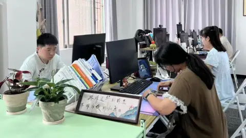 China's unemployed young adults who are pretending to have jobs Attendees at Pretend To Work Company, in the city of Dongguan