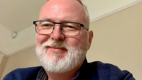Anger and confusion as Meta overturns more Instagram account bans Duncan Edmonstone A picture of Duncan Edmonstone. He is a white man with black glasses and a grey beard. He is wearing a blue jumper.