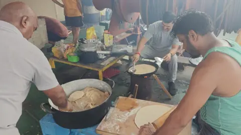 Why India tops the list of abandoned sailors Several crew members of Nirvana vessel, seen cooking food on the ship on makeshift stove in a makeshift, open kitchen.