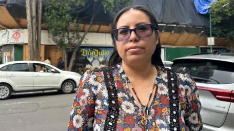 Mexicans protest tourists and gentrification Erika Aguilar stands outside the apartment building where she and her family used to live on a street in central Mexico City