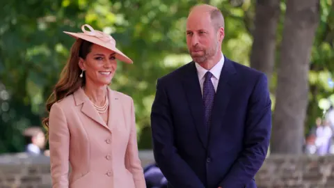 William and Kate set to move to new Windsor home Alberto Pezzali/PA Wire The Prince and Princess of Wales at Datchet Road in Windsor, Berkshire, on day one of the French President's state visit to the UK. Kate is smiling for the camera while William is looking away.