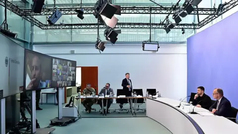 Trump's ceasefire pivot will have caused dismay in Kyiv Getty Images Ukrainian President Volodymyr Zelensky and German Chancellor Friedrich Merz face a screen during a video conference of European leaders with the US President on the Ukraine war ahead of the summit between the US and Russian leaders
