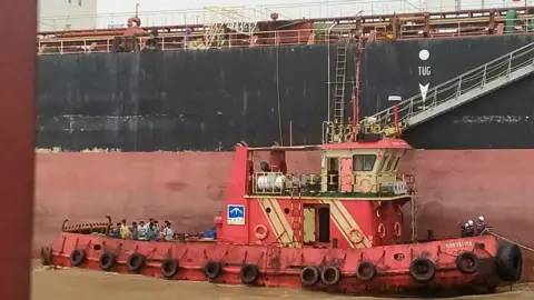 Why India tops the list of abandoned sailors BBC/ITF Crew members of Nirvana vessel were repatriated after months on the sea but continue to wait for their salaries. They are seen standing on a boat next to their vessel to repatriate them to the shore.