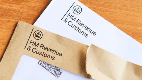 HMRC using AI to scour suspected tax cheats' social media Getty Images Two envelopes, one brown and one white, which have been sent by HMRC. They read "HM Revenue and Customs" on the front with a crown logo.